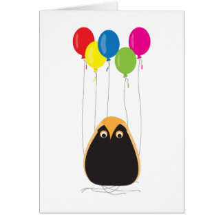 Un hibou chanceux avec les ballons heureux