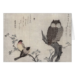 Un hibou et deux bouvreuils orientaux