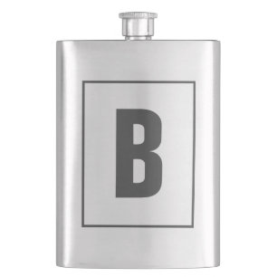 Un monogramme personnalisé de fiole de boisson lui