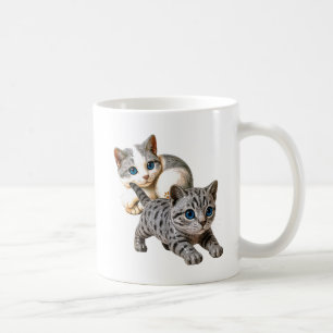 Un mug avec deux chatons très mignons.