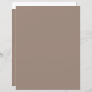 un mur marron avec une horloge