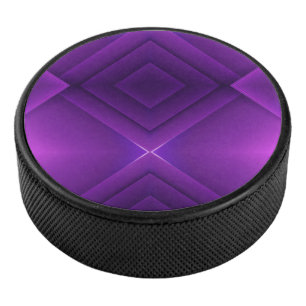 Un palet de hockey violet rond avec un motif géomé