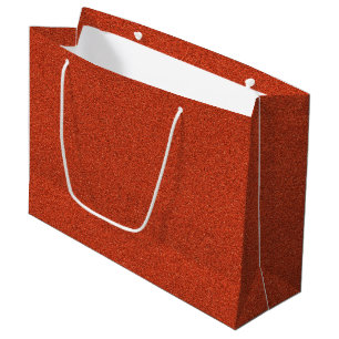 Un sac de shopping en papier rouge scintillant