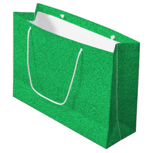 Un sac de shopping vert scintillant avec des poign