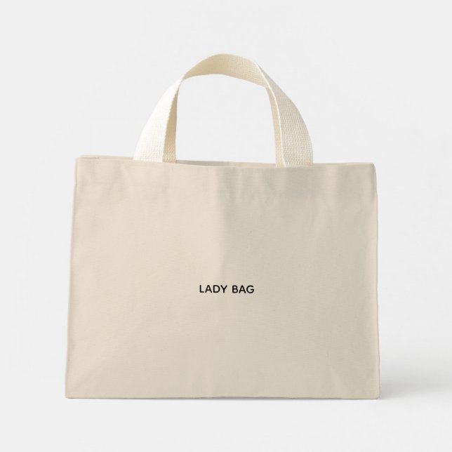Un sac fourre-tout beige avec des poignées blanche (Dos)