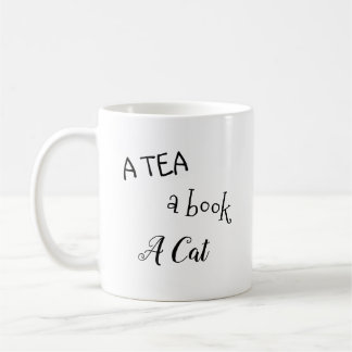 "Un thé, un livre, tasse d'un chat"