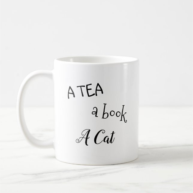 "Un thé, un livre, tasse d'un chat" (Gauche)