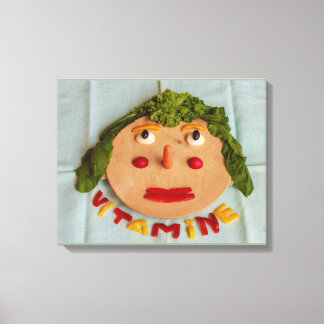 un visage de légumes sur toile enveloppée