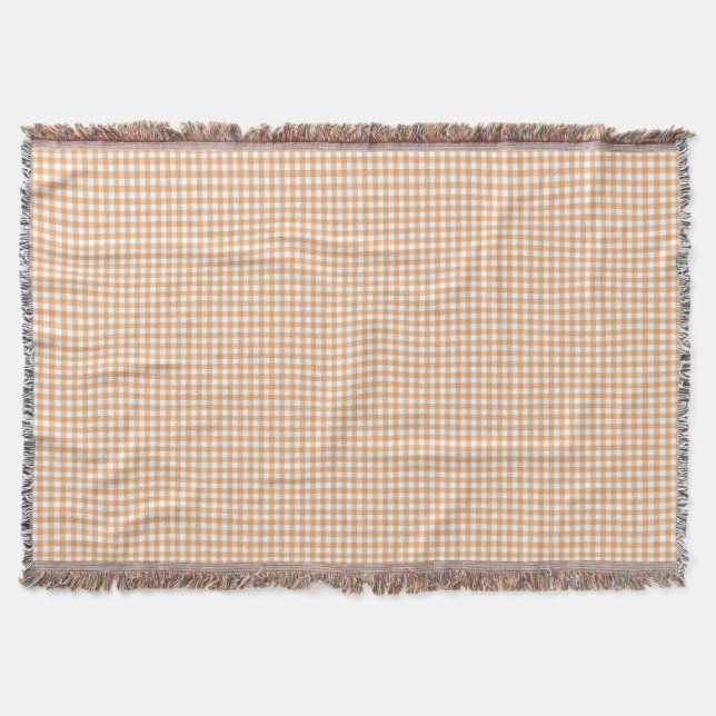 Une couverture à carreaux gingham dans des tons be (Devant)