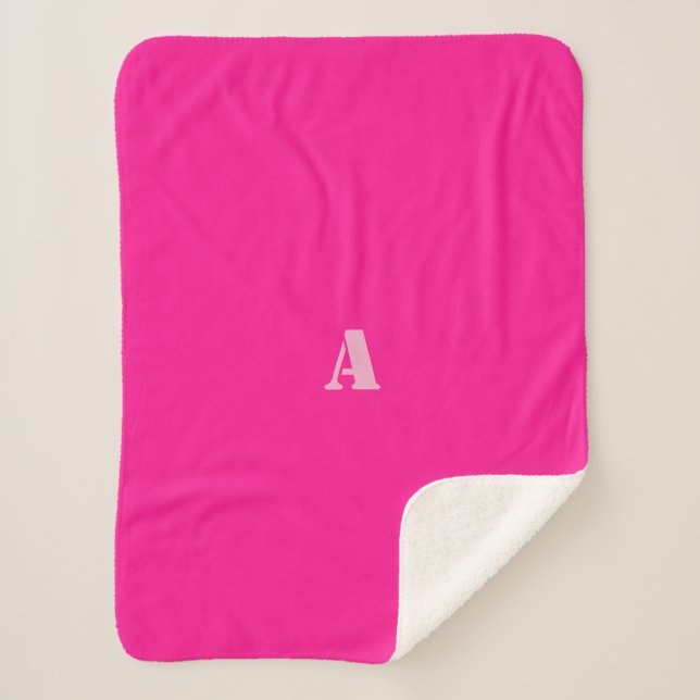 Une couverture en toison rose foncé Monogramme (Devant)