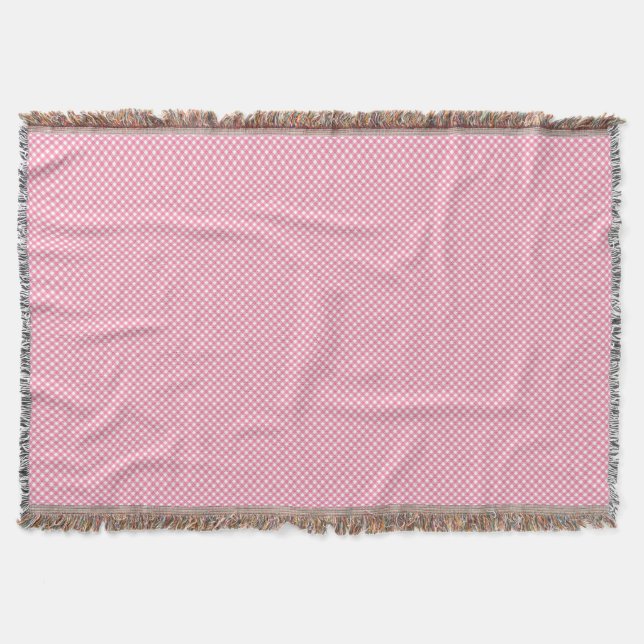 Une couverture tissée rose avec un motif subtil  (Devant)