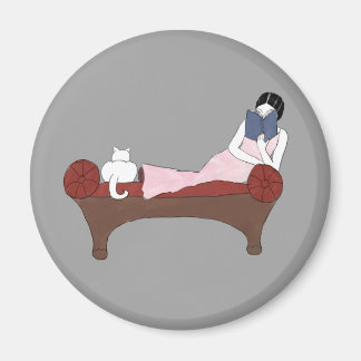 Une dame, un chat et un très bon aimant de livre