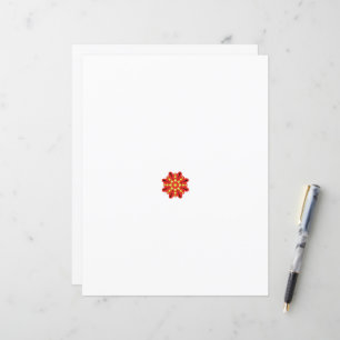 une fleur rouge et jaune avec des points noirs