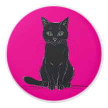 Une poignée de porte en forme de chat noir