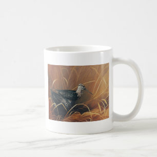 Une tasse de qualité avec une peinture d'un coup
