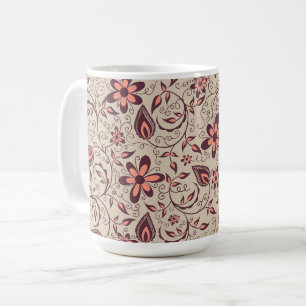 Une tasse en céramique avec un fond beige