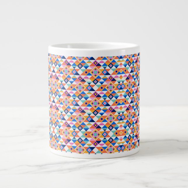 Une tasse en céramique blanche présente une géomét (Devant)