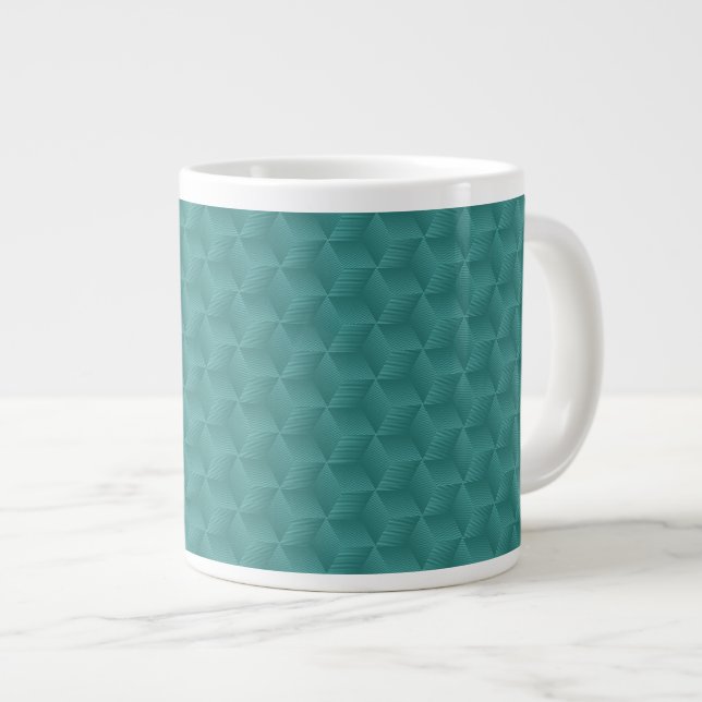 Une tasse sarcelle présente un motif géométrique  (Devant droit)