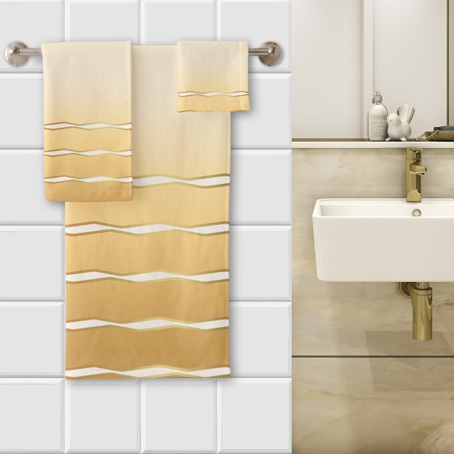 Vague Ivoire Or Soleil (bathroom towel set featuring a wavy design in sunny ocher yellow and ivory with gold)