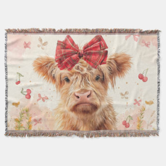 Veau de vache des Highlands avec couverture à jet