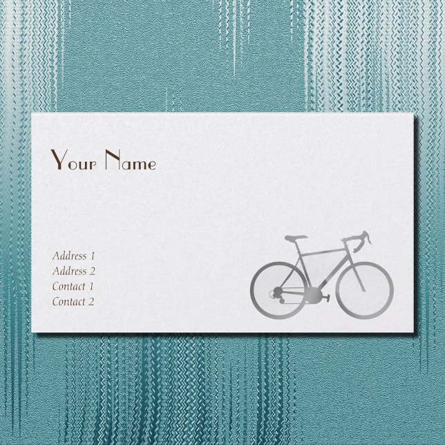 Vélo à l'aspect argenté sur carte de visite blanch (Créateur téléchargé)