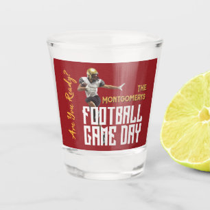 Verre A Shot Joueur de football sur fond rouge