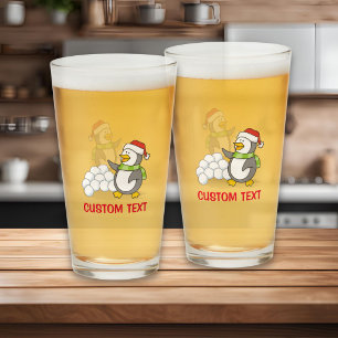 Verre Manchot de Noël avec boules de neige agitant