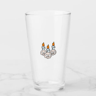 Verre Trois crânes avec des bougies allumées