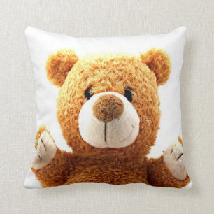 Vers le haut du coussin brun mignon étroit d'ours