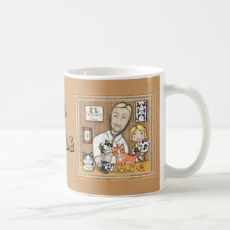 Vétérinaire avec la tasse de café de chatons