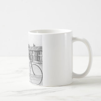 Vieille tasse de café de photo de bicyclette
