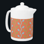 Vins bleus et verts rétro sur motif floral orange<br><div class="desc">Folksy et amusant sont les mots qui viennent à l'esprit quand vous regardez cette vigne douce rétro bleu et vert sur un motif arrière - plan orange floral. Oh si adorable et super mignon aussi. Ce motif classique minimaliste de vigne se traduit parfaitement à la fois par des objets de...</div>