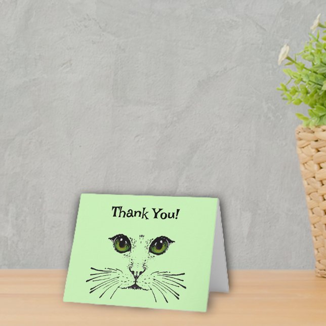 Visage de chat en noir Yeux verts Moustaches Merci (Kitty cat face in black with green eyes and whiskers on light green Thank You cards.)