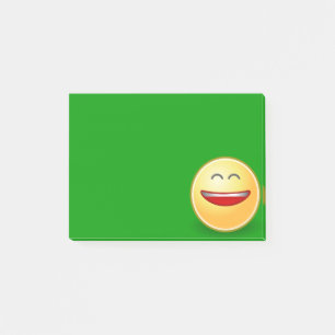 Visage souriant sur un Post-It vert