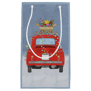 Voiture rouge avec cadeaux de Noël Petit sac cadea