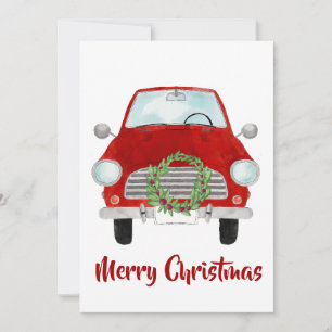 Voiture rouge avec couronne de Noël Carte de vacan