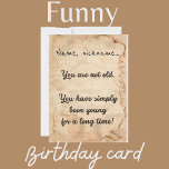 "Vous n'êtes pas vieux..." carte d'anniversaire<br><div class="desc">"Vous n'êtes pas vieux, vous êtes tout simplement jeune depuis longtemps !" est une carte d'anniversaire avec du texte noir sur un arrière - plan de papyrus beige. Customisez le nom à l'avant et l'accueil à l'arrière, plus ajoutez votre propre texte ! Une carte de plaisir pour un ami ou...</div>