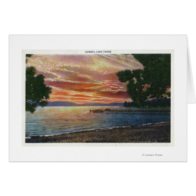 Vue sur le coucher du soleil du littoral avec quai (Devant horizontal)