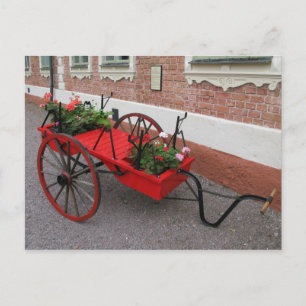 Wagon rouge sur carte postale