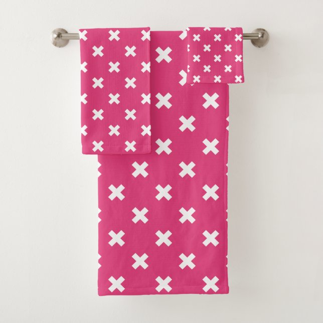 White cross stitches on fuchsia (En situation)