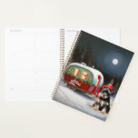 Winter Schnauzer Caravan Christmas Adventure<br><div class="desc">Laissez-vous tenter par la magie d'une nuit d'hiver enneigée alors qu'une caravane glisse gracieusement à travers le paysage illuminé par la lune. La beauté sereine de la neige scintillante et l'éclat enchanteur de la lune créent une scène captivante, promettant une aventure de Noël inoubliable remplie de chaleur, de joie et...</div>