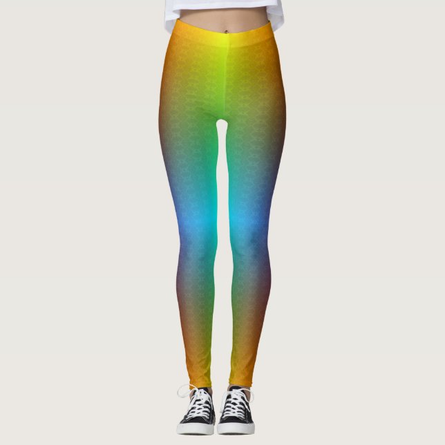 Woman in rainbow gradient leggings with a subtle  (Devant)