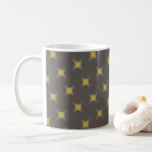 Yellow geometric motifs on grey coffee mug